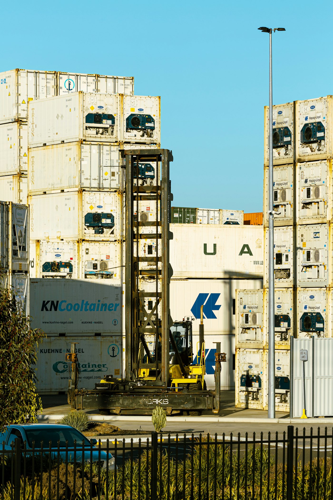 Reach stacker in a container yard
